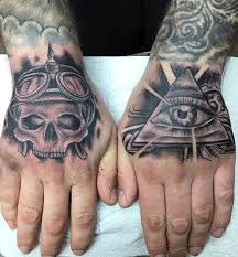 You can ink anything in this area, from huge dragon tattoos to smaller single strip tattoos. Men S Hand Skull Illuminati Hand Tattoo