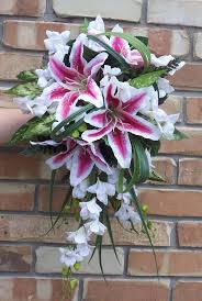 Lindsay bly, a bridal consultant with todich floral design, tells us, cascading bouquets are a more modern version of what we call the shower bouquet by lk lily | photo by sarah gawler via ruffled blog. Stargazer Lilly Cheryl S Wedding Bouquets Silk Wedding Flowers Cincinnati