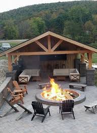Don T Have A Bbq No Worries A Cambridge Wood Burning Fire Pit Can Be Converted Into A Bbq Installation In 2020 Backyard Patio Designs Backyard Fire Backyard Patio