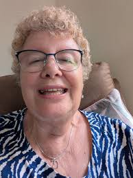 Hi all! I just wanted to introduce myself and share a photo that I took.  This is me showing off my new implant as I'd had a denture as my front tooth