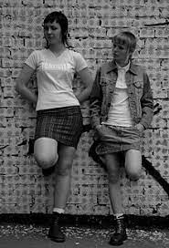 Skinheads were distinct from other british subcultures due to their uniform of boots, jeans, braces (suspenders), and the trademark shaved head. Skinhead Wikipedia