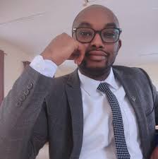 𝗖𝗵𝗮𝗿𝗶𝘁𝘆 𝗧𝗮𝗷𝗲𝘂 𝗰𝗼𝗻𝗴𝗿𝗮𝘁𝘂𝗹𝗮𝘁𝗲𝘀 𝗗𝗮𝗻𝗶𝗲𝗹 𝗢𝗹𝗲  𝗦𝗲𝗲𝗻𝗲𝗶 𝗮𝗳𝘁𝗲𝗿 𝗥𝗮𝗰𝗵𝗲𝗹 𝗥𝘂𝘁𝗼'𝘀 𝗩𝗲𝗵𝗶𝗰𝗹𝗲 𝗴𝗶𝗳𝘁.  "Congratulations my brother, Daniel Senei,, Keji ENKAI"