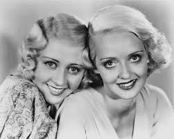 Glenda Farrell and Betty Compson in a publicity photo for "Blondes at Work"  (1938).