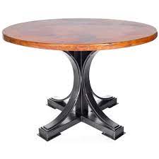 This unique and beautiful dark brown copper dining table adds a touch of elegance to your dining experience. Winston Iron Dining Table With 72 In Round Hammered Copper Top
