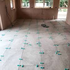 Use vinegar and baking soda and hot water to clean the family of staylock floor tiles. Laying The Large Format Floor Tiles Build It