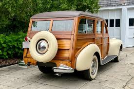 Image result for Titian Maroon 1940 Oldsmobile