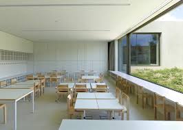 Swiss Kindergarten Housed In Quartet Of Concrete Blocks Classroom Architecture Architecture Prangins