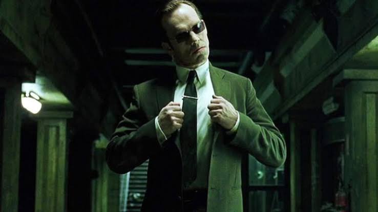 The Matrix Resurrections Reveals New Take on Hugo Weaving's Agent Smith |  Den of Geek