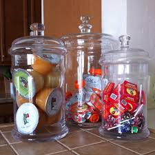 For instance, use a small one to hold cotton balls or swabs, and opt for a taller container to hold hairbrushes and combs. Check Out These 40 Ways To Fill Your Apothercary Jars