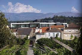 • municipal stadium (5.6 mi/9 km from the city center). Residential Building Vila Nova De Tazem Nuno Ladeiro