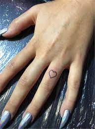 40 Tiny Yet Gorgeous Finger Tattoo Ideas You Must Love Cute Hostess For Modern Women Small Heart Tattoos Shape Tattoo Small Finger Tattoos