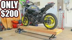 With a table lift, you'll no longer have to work on the floor side extensions (or foot extensions) for your motorcycle table lift are an easy diy project that allows you to ride your bike on and off of the lift. 11 Diy Motorcycle Lift Plans For Bike Owners