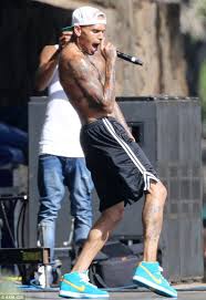 Bad boy rapper chris brown is famous for his great collection of tattoos. Chris Brown Relaxes With Karrueche Tran In Hawaii As He Puts Community Service Ruling Behind Him Daily Mail Online