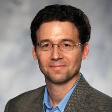 Acoustic Control of a Spherical Bubble Via a Koopman Linear Quadratic  Regulator