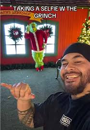 Grinch Sneaking Up During Pics