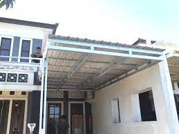 Sebanyak 63 desain kanopi rumah minimalis modern ini kami sajikan untuk anda yang sedang merencanakan pembanguan kanopi, yakni bangunan menjorok ke depan pada bangunan rumah, kantor dan sebagainya dengan fungsi melindungi bagian rumah sepertti jendela, pintu, atau ventilasi udara dari cuaca panas dan hujan. 20 Desain Kanopi Minimalis Untuk Teras Depan Rumah