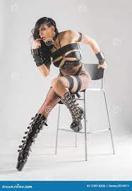 Bdsm woman with chair stock photo. Image of cute, attractive - 110918200