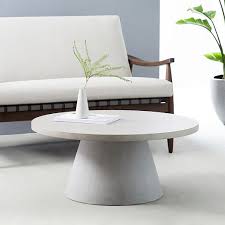 Iron legs in a bronze finish. Pedestal Outdoor Coffee Table