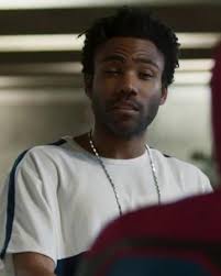 Is Aaron Davis from spider-man homecoming miles morales uncle? He was  trying to by some of the alien tech, like he had in spider-man into the  spider verse. And he even said