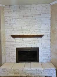 The pros and cons of manufactured stone. White Stone Fireplace Beyond Remodels