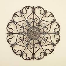 Features handcrafted wrought iron baskets with a durable matte black powder coat finish For The Kitchen Wall Iron Wall Decor Wrought Iron Wall Decor Iron Wall Art