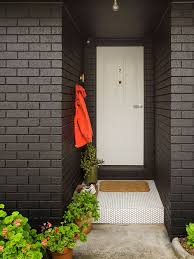 Black And White Brick Paint Graphic Modernism In Melbourne Painted Brick House Brick Exterior House Painted Brick Exteriors