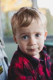 Maybe you would like to learn more about one of these? Cute Toddler Boy In Plaid Shirt With Big Eyes Looking At Camera By Rob And Julia Campbell