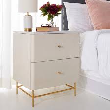 This amazing nightstand sports the perfect blend of gold and white on its design and would make for a nice addition to your home decor, sporting the look that is easy to blend with most contemporary settings, while at the same time offering some more space. Safavieh Couture Channing 2 Drawer Nightstand White Gold White And Gold Nightstand Gold Bedroom White Nightstand