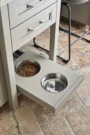 Store the dog food in the angled door pantry. Slide Out Dog Bowl Design Ideas
