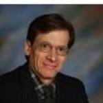 Dr. Elliot M. Henson, MD