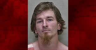 Fort McCoy man accused of battering showering woman