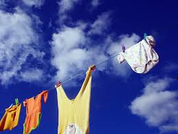 The best place to start when you're debating between washing laundry in hot or cold water is to read the label. Hd Wallpaper Four Assorted Color Clothes Hanging On Rope Clothes Line Wash Clothes Wallpaper Flare
