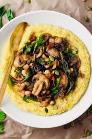 Mixed into a salad or served up as a burger substitute, mushrooms are a great way to satisfy a vegetarian's meat. Creamy Vegan Polenta With Mushrooms And Beans Emilie Eats