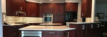 Bold accents, like red placemats on a kitchen island or an orange vase would also work nicely in such kitchens. Bright Kitchen With Dark Cabinets And White Countertops Bay Area Kitchens