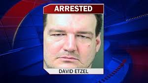 Man charged with biting dog, ripping eye out of socket