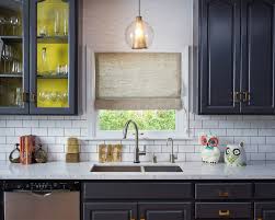 Blue can easily be a neutral color category all on its own, but the variation can be striking. Navy Kitchen With White Tiles Novocom Top