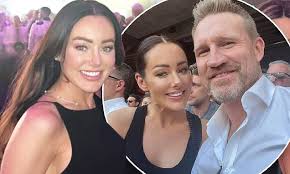 Perks of being a WAG! Nathan Buckley's girlfriend Brodie Ryan is all smiles  as she attends Grand Final celebrations with AFL star beau