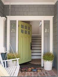 love the style of this door and the exterior house color steve is not a fan of the green for a door house exterior cottage front doors green front doors