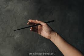 Lay the first chopstick between the base of your thumb. How To Use Chopsticks Omnivore S Cookbook