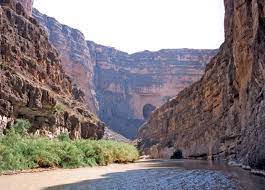 From there, the trail slopes gradually down to the river's edge inside the canyon and continues farther winding among. Santa Elena Canyon Big Bend National Park Texas