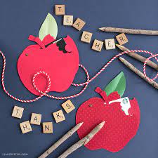 Fold the side tabs in and add adhesive to the wide part. Make A Papercut Apple Gift Card Holder To Say Thanks To Your Teacher