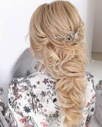 If you have thick and long hair then you can definitely try a long braid with a crown looking puff in the middle. 30 Mother Of The Bride Hairstyles 2017 Herinterest Com