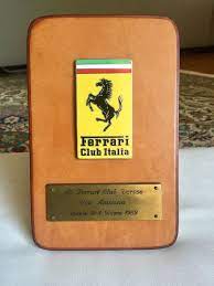 Maybe you would like to learn more about one of these? Commemorative Ferrari Club Italia Plate Schedoni Leather Catawiki