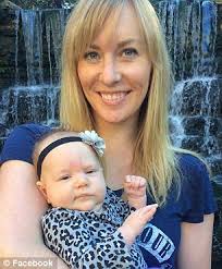 Baylor professor holds student's baby girl in his arms while teaching  lecture