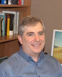 Daniel E. Russ, Ph.D., biographical sketch and research interests