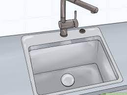 Improvement and repair cost updated 2020. 4 Ways To Fix Your Kitchen Sink Wikihow