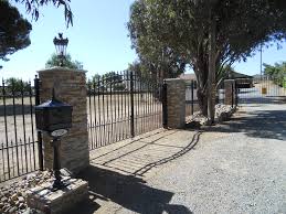 Making a sliding gate solely out of wood was going to take a little bit of thought as my inquiries told me that most substantial sliding gates required a metal frame to prevent warping. Wrought Iron Gates