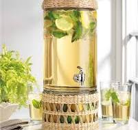 Moderna cesta de mimbre con dispensador de bebidas de vidrio transparente  frío de 2 galones con espita con base de vidrio de ratán para frutas o  cubos ...