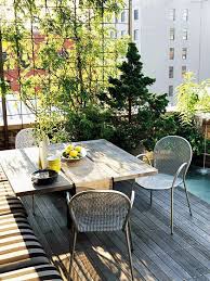 Small Terrace Design Ideas With Metal Chairs And A Mini Garden In Pots Small Balcony Garden Patio Design Trellis Fence