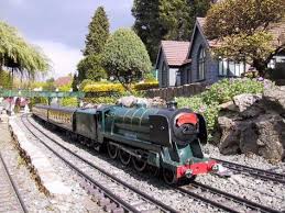 Garden trains run outside, surrounded by real miniature trees and water features. 89 Garden Trains And Rail Roads Ideas Garden Trains Garden Railroad Garden Railway